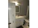 Bathroom with white vanity, toilet, and shower/tub at 323 Breslin St, Wadesboro, NC 28170