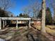 Brick ranch house with carport and paved driveway at 323 Breslin St, Wadesboro, NC 28170