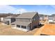 Aerial view of backyard featuring a covered patio perfect for outdoor entertainment and relaxation at 622 Amberjack Pl, York, SC 29745