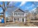 Front view of two-story house with white siding and dark accents at 624 W Kerr St, Salisbury, NC 28144