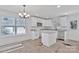 Modern kitchen with white cabinets and granite island at 624 W Kerr St, Salisbury, NC 28144