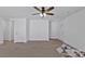 Spacious living room with ceiling fan and two doors at 624 W Kerr St, Salisbury, NC 28144