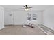 Bright living room with new flooring and ceiling fan at 624 W Kerr St, Salisbury, NC 28144