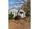 Charming single-Gathering home features a cozy front yard with mature landscaping and a classic design at 805 Railroad Ave, China Grove, NC 28023