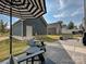 Relaxing backyard patio with brick pavers, seating area, and detached shed at 946 Emory Ln, Fort Mill, SC 29708