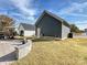 Gray detached garage with a small garden at 946 Emory Ln, Fort Mill, SC 29708