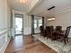 Formal dining room with hardwood floors, chandelier, and a large table at 946 Emory Ln, Fort Mill, SC 29708