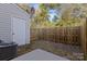 Private backyard with wooden fence and patio at 13660 Meade Glen Ct, Charlotte, NC 28273