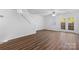 Living room with hardwood floors and French doors at 13660 Meade Glen Ct, Charlotte, NC 28273