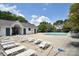 Inviting community pool with plenty of lounge chairs at 13660 Meade Glen Ct, Charlotte, NC 28273