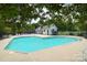 Community pool with lounge chairs and changing rooms at 13660 Meade Glen Ct, Charlotte, NC 28273