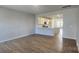 Open-concept living space with wood flooring and a view of the modern kitchen at 159 Ella Claire Dr, York, SC 29745