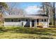 View of the backyard with the back door and steps leading to the ground level at 1637 Sumner Dr, Rock Hill, SC 29732