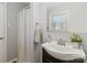 This bathroom features a sink and vanity, window and shower at 1637 Sumner Dr, Rock Hill, SC 29732