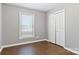 The bedroom features laminate floors, a window, and closet at 1637 Sumner Dr, Rock Hill, SC 29732