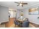 Dining room with table set for four, featuring a view of the kitchen and stainless steel refrigerator at 1637 Sumner Dr, Rock Hill, SC 29732