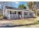 Charming single-story home with grey siding and a quaint front porch at 1637 Sumner Dr, Rock Hill, SC 29732