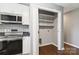 Kitchen pantry next to stainless steel oven and microwave at 1637 Sumner Dr, Rock Hill, SC 29732