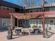 Relaxing courtyard with pergola and picnic tables at 2000 Patio Ct # 129, Charlotte, NC 28205