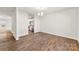 Dining room with hardwood floor, view into kitchen at 221 Brenett Francis Ct, Charlotte, NC 28214