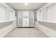 Spacious walk-in closet with ample shelving at 221 Brenett Francis Ct, Charlotte, NC 28214