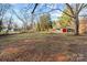 Large backyard with mature trees and shed at 2930 W Innes St, Salisbury, NC 28144