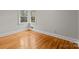 Well-lit bedroom with hardwood floors and a large window at 2930 W Innes St, Salisbury, NC 28144