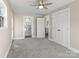 Spacious bedroom features plush carpet and a ceiling fan at 529 Catalina Dr, Albemarle, NC 28001