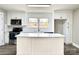 Bright kitchen featuring a large island, stainless steel appliances, and modern white cabinetry at 529 Catalina Dr, Albemarle, NC 28001