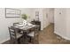 Small dining area with four chairs and a modern square table at 7109 N Mills Rd, Charlotte, NC 28216