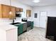 Modern kitchen with wood cabinets and marble countertops at 123 Oak St, Chester, SC 29706