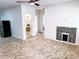 Open living area with herringbone flooring and fireplace at 123 Oak St, Chester, SC 29706