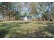 Spacious backyard with a tree-lined setting at 129 Doster Rd, Lancaster, SC 29720