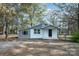 Newly renovated house with gray siding and white accents at 129 Doster Rd, Lancaster, SC 29720