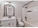 Updated bathroom with bathtub, shower, and modern vanity at 161 Westscott Dr, Statesville, NC 28625