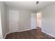 Simple bedroom with wood floors and two closets at 161 Westscott Dr, Statesville, NC 28625