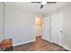 Bedroom with hardwood floors, ceiling fan and double doors at 161 Westscott Dr, Statesville, NC 28625