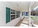 View from the covered porch featuring white railing and green shutters enhancing the curb appeal at 161 Westscott Dr, Statesville, NC 28625