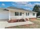 Inviting front porch with white railings and green shutters enhancing curb appeal at 161 Westscott Dr, Statesville, NC 28625