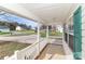 White-railinged front porch with view of a quiet residential street at 161 Westscott Dr, Statesville, NC 28625