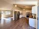 Open kitchen showcases butcher block counters, stainless steel appliances, and seamless flow to the living area at 161 Westscott Dr, Statesville, NC 28625