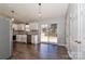 Modern kitchen with stainless steel appliances and wood-look flooring at 161 Westscott Dr, Statesville, NC 28625