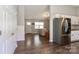 Living Room leading into the kitchen. The home has wood look flooring at 161 Westscott Dr, Statesville, NC 28625