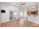 Bright dining area with hardwood floors and sliding glass doors to patio at 18107 Amberwood Glen Dr, Cornelius, NC 28031