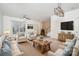 Bright and spacious living room featuring hardwood floors and ample natural light at 18107 Amberwood Glen Dr, Cornelius, NC 28031