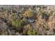 Aerial view showing home's location in wooded area at 2029 Big Dipper Dr, Clover, SC 29710