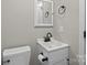 Small bathroom with a toilet and pedestal sink at 2029 Big Dipper Dr, Clover, SC 29710