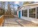 Exterior of home featuring front porch, blue door, and wooded backdrop at 2029 Big Dipper Dr, Clover, SC 29710