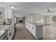 Modern kitchen with granite countertops, white cabinets, and stainless steel appliances at 2029 Big Dipper Dr, Clover, SC 29710