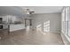 Bright living room featuring hardwood floors and a cozy stone fireplace at 2029 Big Dipper Dr, Clover, SC 29710